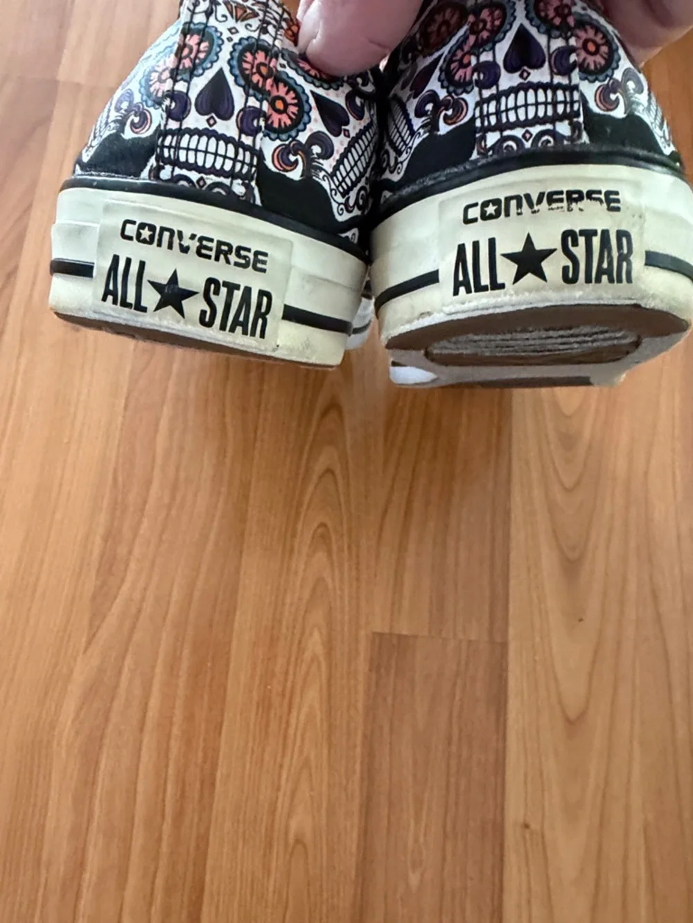 Converse mens  Low Top Sneakers in Black with Orange and Purple Skull Pattern